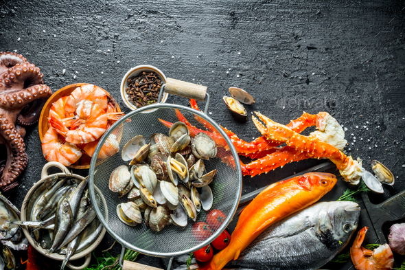 Seafood. Oysters with fresh fish, crab and shrimp. Stock Photo by Artem_ka2