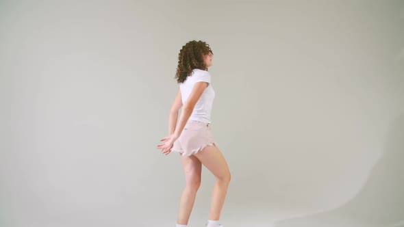 Girl with Curly Hair Dancing alt