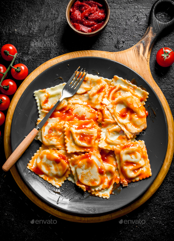Ravioli with veal and tomato sauce. Stock Photo by Artem_ka2 PhotoDune