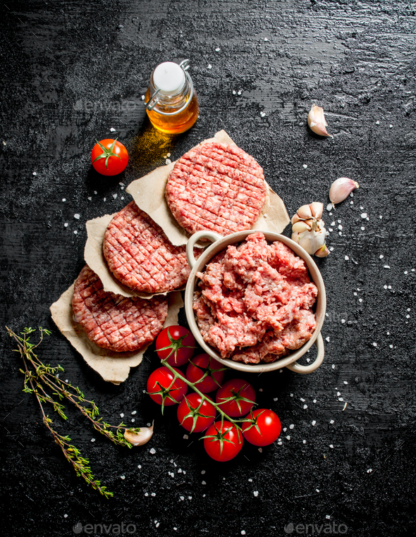 Minced beef Burger with tomatoes, oil and garlic. Stock Photo by Artem_ka2