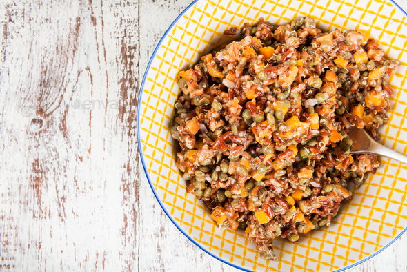 Red rice, lentils and butternut squash with carrot and quinoa in