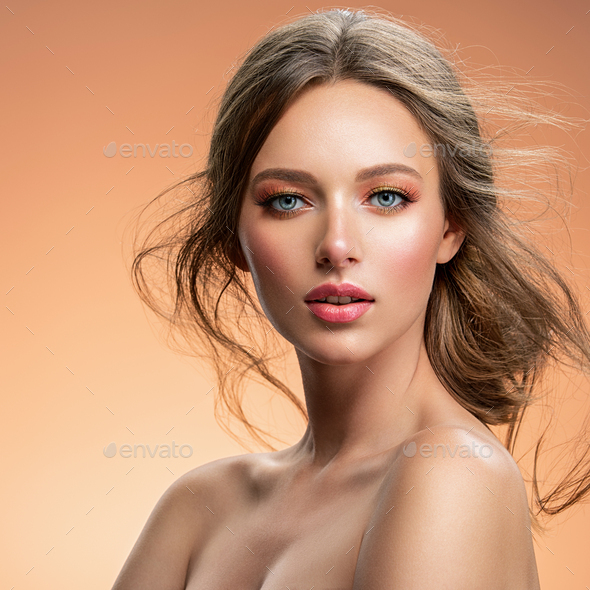 Portrait of a beautiful woman with a long hair. - Stock Photo - Images