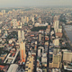 Metropolis port city of Manila at sea bay aerial view. Urban cityscape of streets and roads