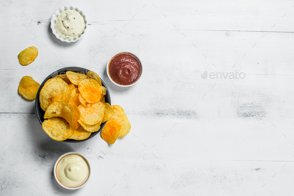 Potato chips with sauces. Stock Photo by Artem_ka2 | PhotoDune