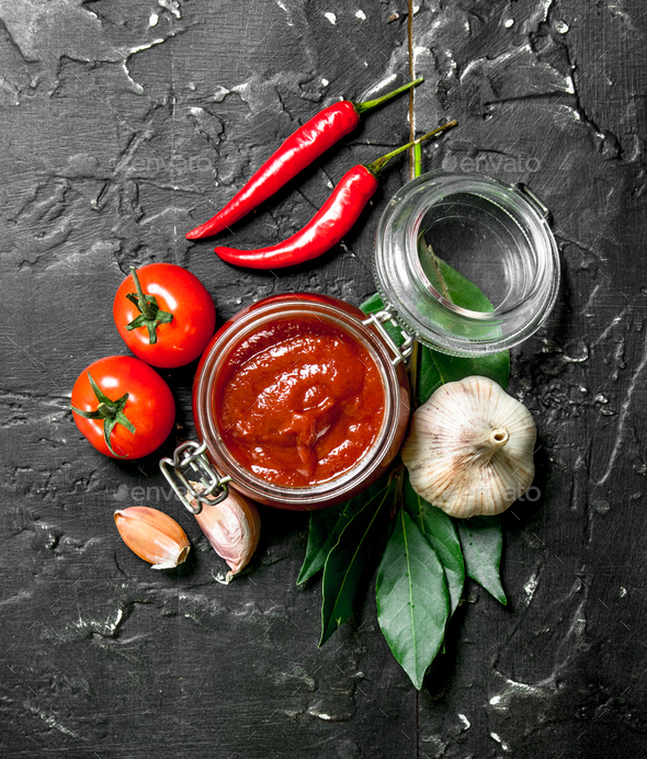 Tomato sauce with Bay leaf, garlic and pepper. Stock Photo by Artem_ka2