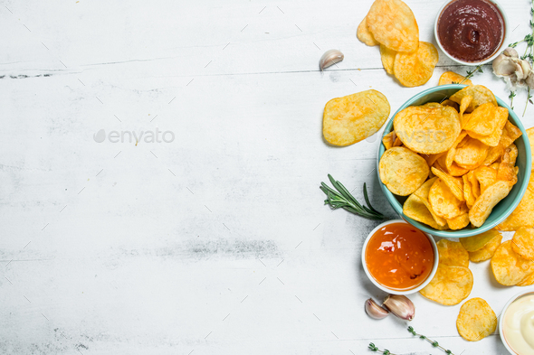 Potato chips with sauces. Stock Photo by Artem_ka2 | PhotoDune