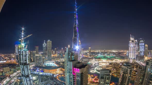 Dubai Downtown Cityscape with Burj Khalifa LightUp Light Show Aerial Timelapse alt
