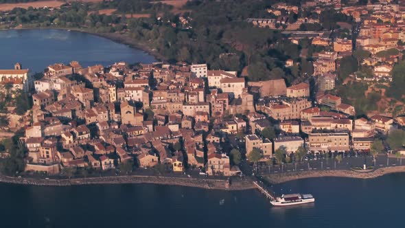 Bracciano lake and town in Rome Province, Lazio, Italy. Aerial drone view alt