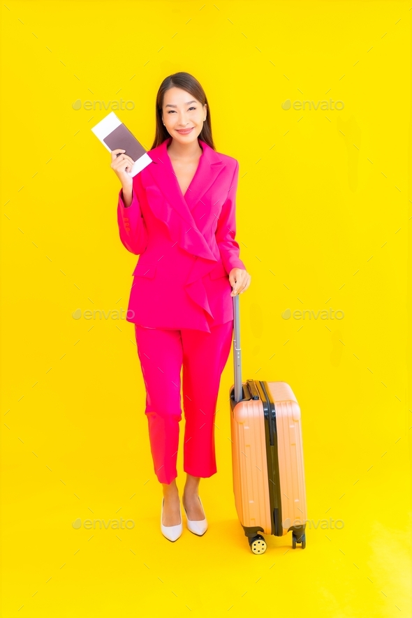 Portrait beautiful young asian woman with luggage boarding pass and passport Stock Photo by siraphol