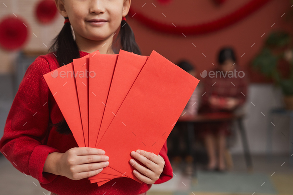 Cute Asian Girl With Red Packets