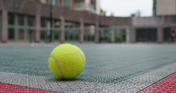 Tennis ball on a tennis court - Stock Photo - Images