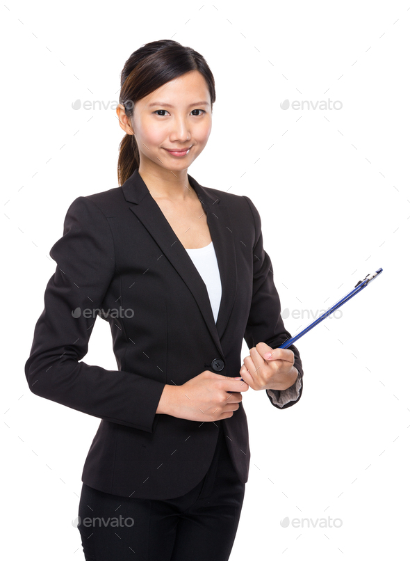 Businesswoman with clipboard - Stock Photo - Images