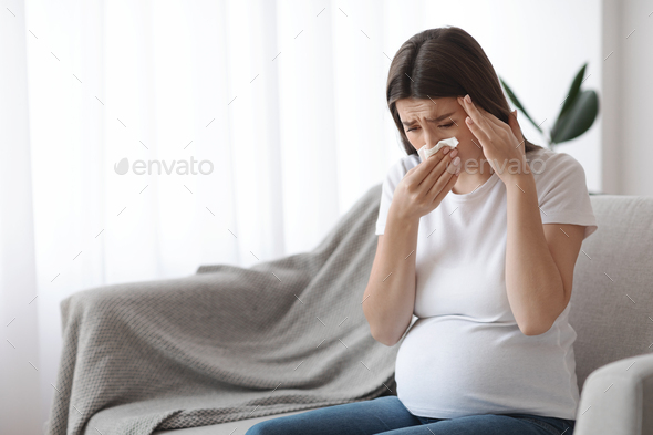 Pregnancy Illness. Sick Young Pregnant Woman Feeling Unwell At Home