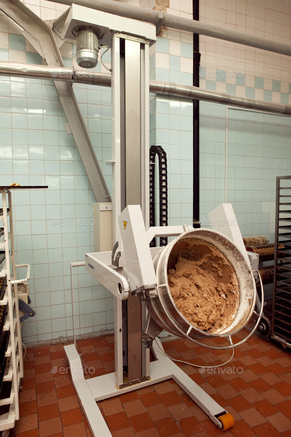 cookie making machine in the factory Stock Photo by Lobachad