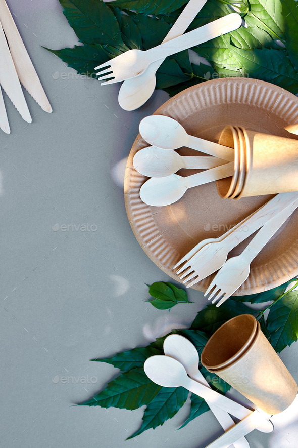 Flat lay of eco craft paper and wooden tableware, Zero waste