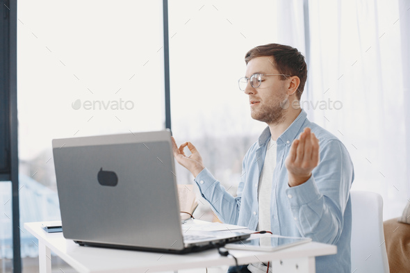 Male has lesson online e-learning in internet concept - Stock Photo - Images