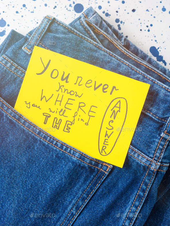 Jeans pocket closeup with inspirational quote
