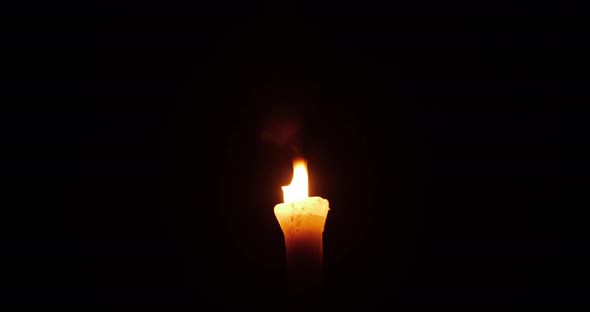 Burning Torch On A Black Background At Night