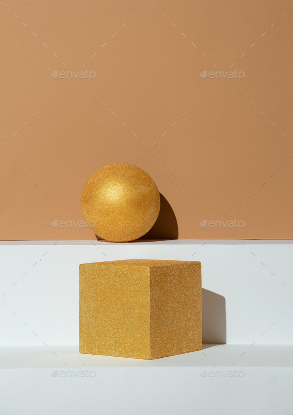 Figures, golden ball and cube geometry. Abstraction minimal still life. Holiday, christmas concept