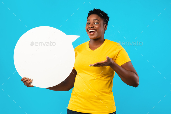 Happy Black Lady Posing With Speech Bubble Over Blue Background