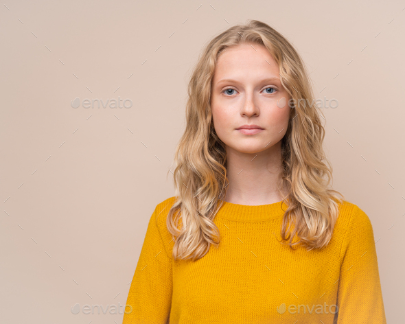 Waist of beautiful serious clever blonde Scandinavian woman without makeup Stock Photo by Natabuena