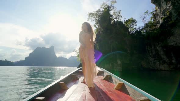 Curly Haired Model Riding on Canoe alt