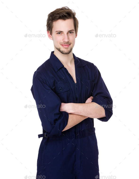 Smiling young mechanic in boiler suit