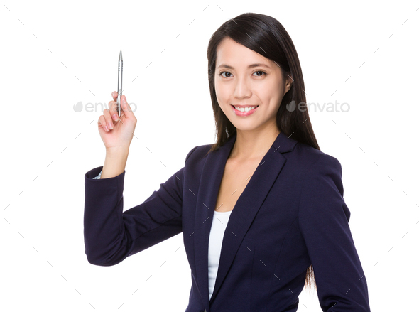 Businesswoman with pen point upwards