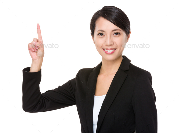 Businesswoman with finger point upwards