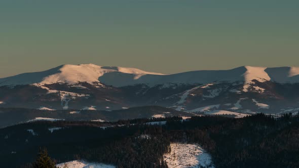 Aurora Time Lapse in Winter Mountain alt