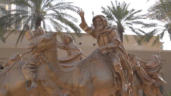 a Statue of a Bedouin on a Camel