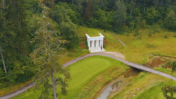 Designed Wedding Venue Stage with Large White Columns alt