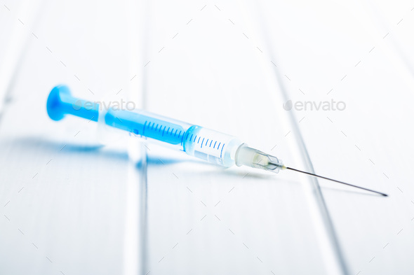 Injection syringe. Covid-19 coronavirus vaccination. Corona virus vaccine.