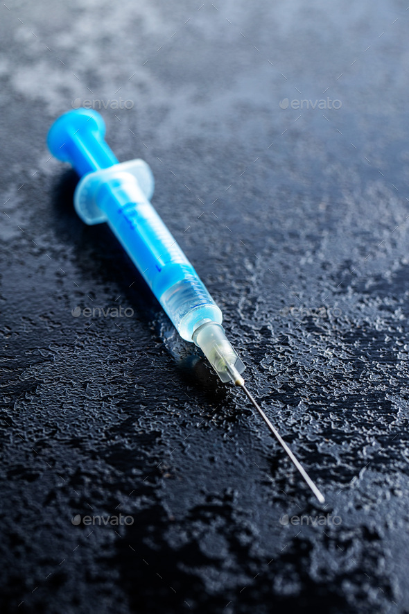 Injection syringe. Covid-19 coronavirus vaccination. Corona virus vaccine.