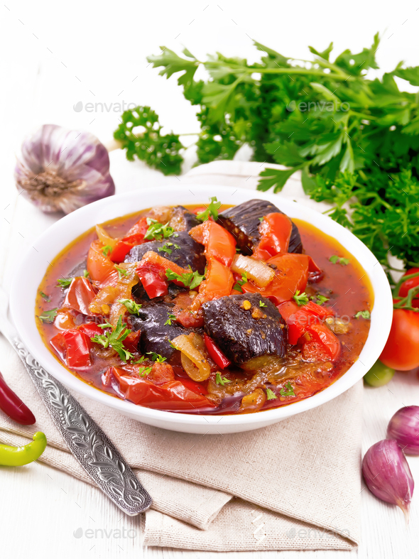 Ragout vegetable with eggplant on wooden board - Stock Photo - Images