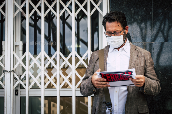 Portrait of man wear medical mask for coronavirus economy crisis with closed business