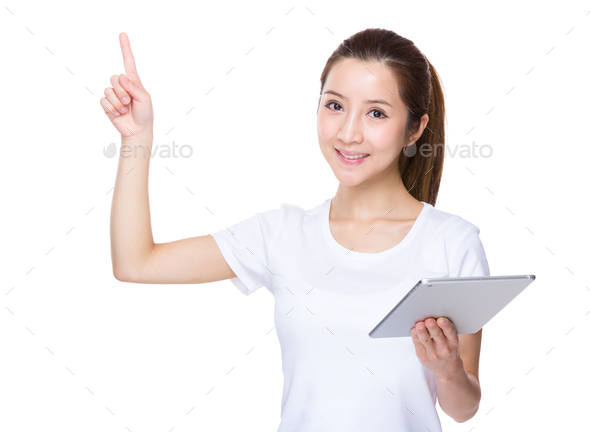 Woman hold with tablet and finger point upwards