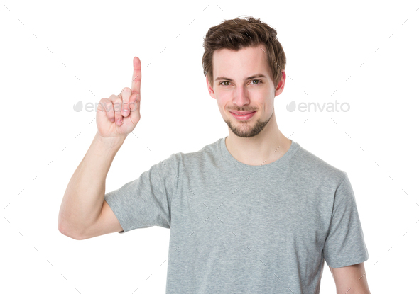Young man with finger point upwards