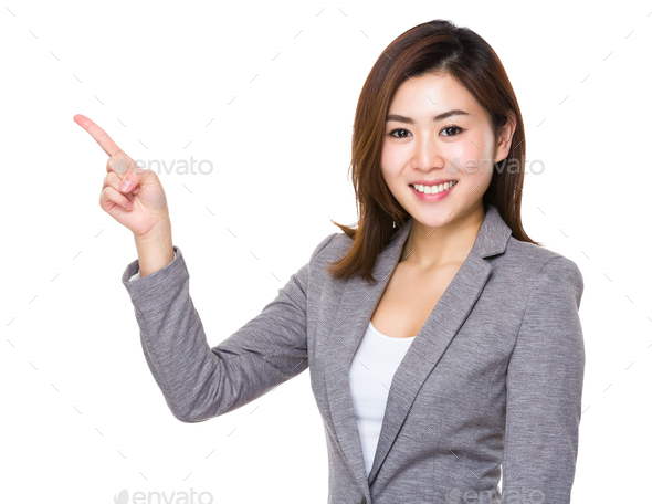 Asian businesswoman with finger point upwards