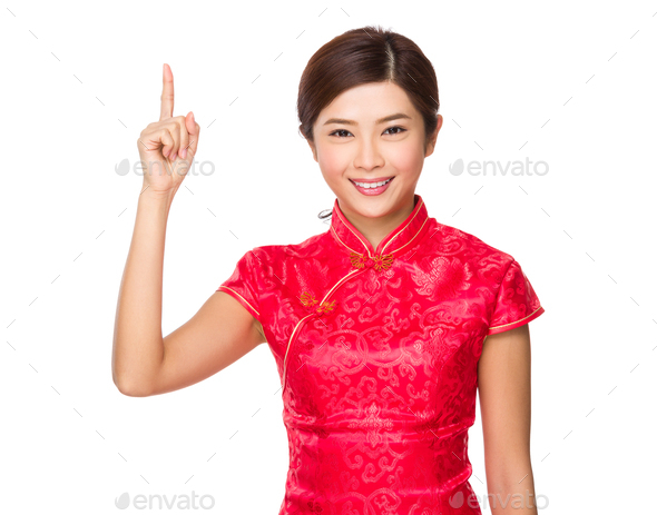 Chinese woman with finger point upwards