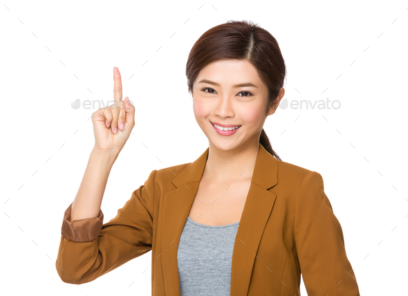 Businesswoman with finger point upwards