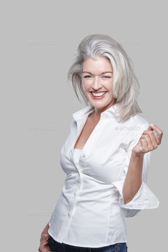 Portrait, attractive vivacious mature Caucasian woman with silver hair ...