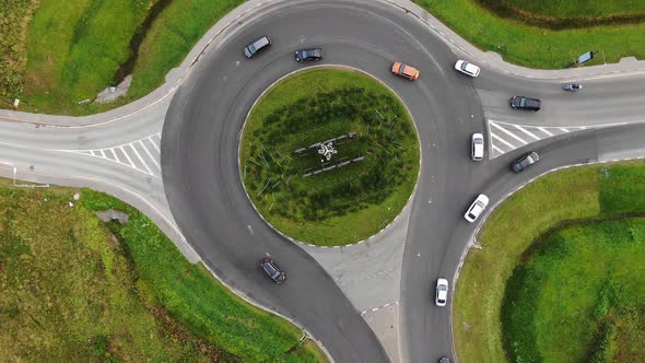 Cars Moving Along the Roundabout Aerial View alt