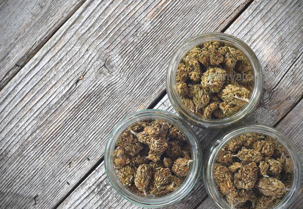 Download Dry And Trimmed Cannabis Buds Stored In A Glas Jars Stock Photo By Urospoteko