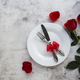 Festive table setting with red roses for valentines day. - PhotoDune Item for Sale