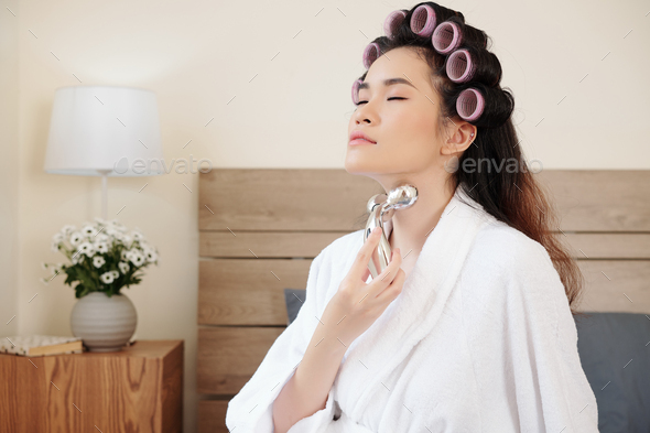 Woman massaging her neck