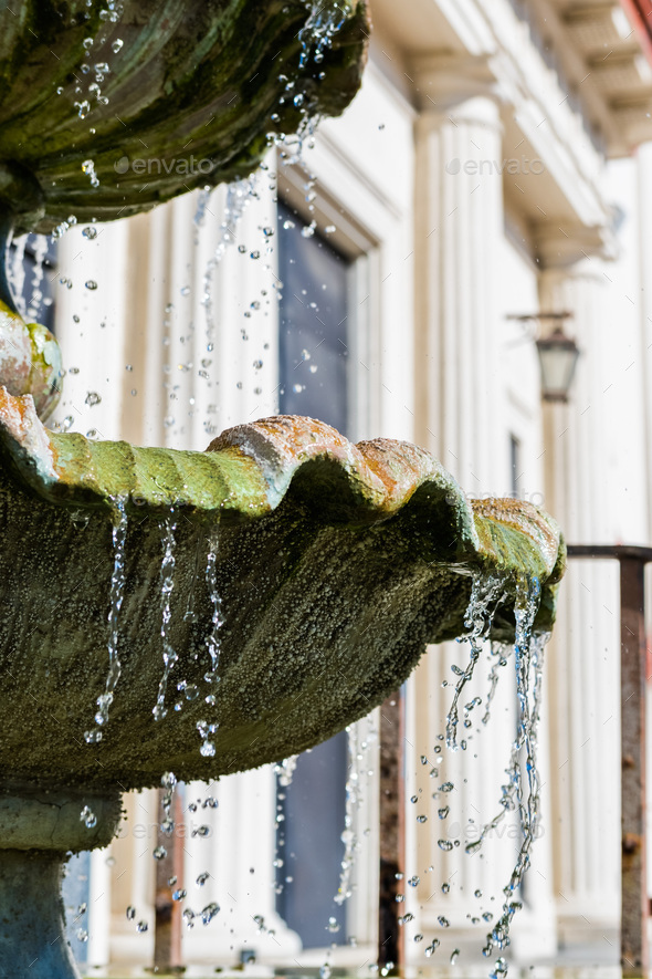 Water dripping down from a water fountain Stock Photo by SundryPhotography