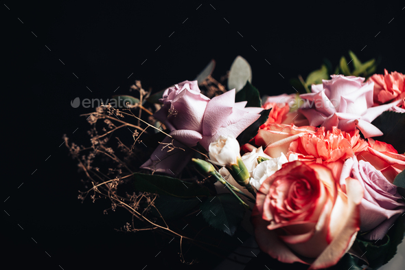 bunch of flowers with black background