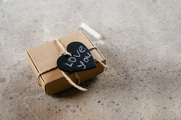 Gift Eco friendly Present box with heart and text Love you. Valentine's Day concept. Copy space - Stock Photo - Images