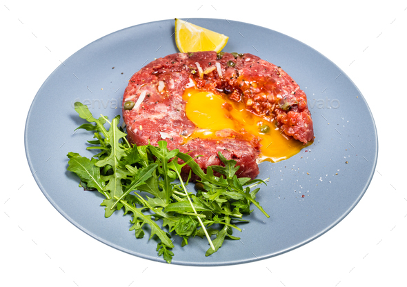 served Steak tartare on blue plate isolated - Stock Photo - Images